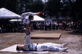 Xuefei Leng lifts Dan Dan Zhao at the Florida Folklife Festival - White Springs, Florida.