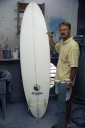 Pat Madden with a surfboard - Saint Augustine, Florida.