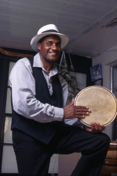 Miguel Lanzo plays one of the musical instruments - Orlando, Florida.