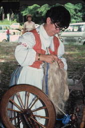 Anne Lunestad spinning flax at the 1977 Florida Folk Festival - White Springs, Florida