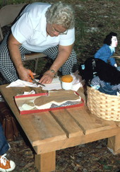 Bertha Burnham making clothes for dolls at the 1977 Florida Folk Festival - White Springs, Florida