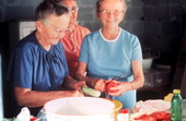 Members of Bethlehem Primitive Baptist Church preparing food - Old Chicora, Florida