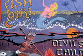 Painted sign for the "Fish Girl" and "Devil's Child" sideshows