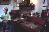 Unidentified cigar maker taking a break to have his picture taken