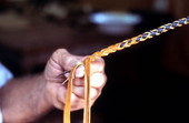 Claude Sheppard braiding a whip - Gainesville, Florida.