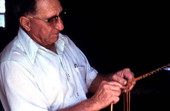 Claude Sheppard braiding a whip - Gainesville, Florida.