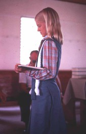 Girl singing from the Sacred Harp book at the Bethlehem Primitive Baptist Church - Old Chicora, Florida