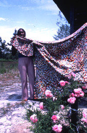 Queenie Udell holding a yo-yo quilt she made- White Springs, Florida