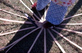 Lucreaty Clark starting to weave a white oak basket
