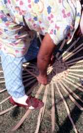 Lucreaty Clark starting to weave a white oak basket