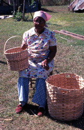 Lucreaty Clark with the white oak baskets she made