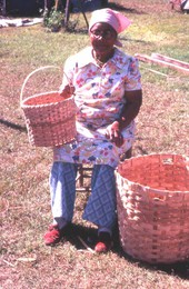 Lucreaty Clark with the white oak baskets she made