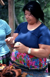 Mary B. Billie sewing a Seminole doll head stuffed with palmetto fiber - Big Cypress Reservation, Florida
