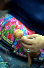 Mary B. Billie sewing a Seminole doll head to the body - Big Cypress Reservation, Florida
