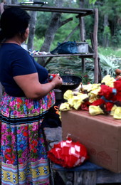 Mary Billie adding finishing touches to dolls - Big Cypress Seminole Indian Reservation