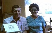 Mr. and Mrs. Rafael Martinez holding an open box of Ramar Cigars - Miami, Florida