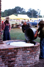 Pouring out sugar cane syrup - Orlando, Florida.