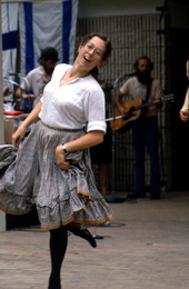 Cross Creek Clogger dances to music from a band behind her - White Springs, Florida