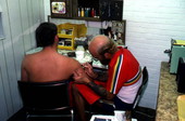 Tattoo artist Jon Fort at work - Pensacola, Florida.