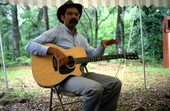 Roy Book Binder playing guitar - White Springs, Florida