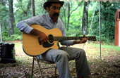 Roy Book Binder playing guitar - White Springs, Florida