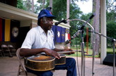 Tom Walton playing guitar - White Springs, Florida
