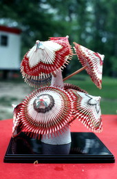 Miniature umbrellas made from cigarette cartons by Hisako Williams - Jefferson County, Florida