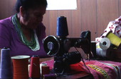 Seminole woman patchwork sewing - Brighton Reservation, Florida