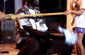 Member of the Junkanoos limbo dancing - White Springs, Florida
