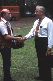 Secretary of State George Firestone shaking hands - White Springs, Florida