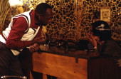 Harold Andrews and Ida Goodson discussing music - Pensacola, Florida.
