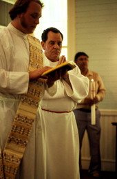 Chuck Bard and Miguel Alvarez performing a baptismal ceremony - Seville, Florida