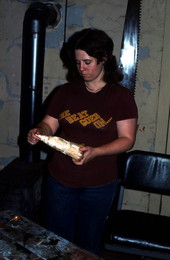 Wood-carver Susan Yohn holding one of her pieces - Orangedale, Florida