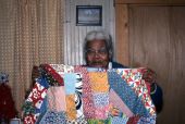 Ruth Rowe with a "crazy square" quilt she made - Pomona Park, Florida.