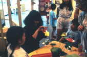 Yasuko Dawson making origami - Jacksonville, Florida.