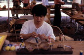 Fu-Ying Chang making rice dough figures - White Springs, Florida