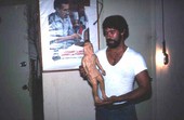 Jose Orta with a woodcarving - Miami, Florida