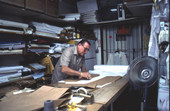 Ramon Puig measuring a pattern to make clothing - Miami, Florida.