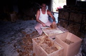 Worker cutting sponges - Miami, Florida.