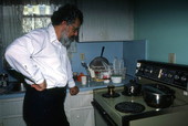 Father Elias, of St. Athanasius Church, making Greek coffee- Miami, Florida