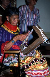 Lottie Shore weaving a sash - White Springs, Florida.