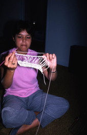 Mingly Caminero-Beheit making a hammock - Miami, Florida.
