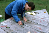 Ormond Loomis takes measurements of 12 foot "dinky" - Eastpoint, Florida