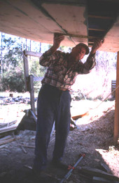 Bud Seymour takes measurements for new planks : Apalachicola, Florida.