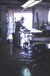 Clay Vioria cleaning fish at Toranto's Fish House - Apalachicola, Florida.
