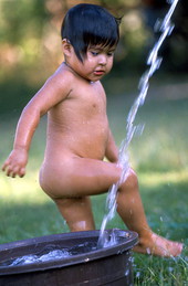 Addie Billie's greatgrandson playing in water - Ochopee, Florida