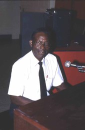 Alex McBride playing blues piano at Pine Estates Elementary School - Jacksonville, Florida.