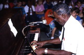 Alex McBride playing blues piano at Pine Estates Elementary School - Jacksonville, Florida
