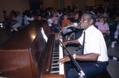 Alex McBride playing blues piano at Pine Estates Elementary School - Jacksonville, Florida.