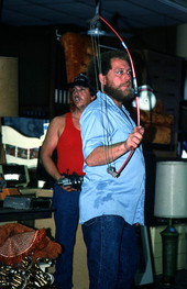 Furniture store personnel acting as handlers and bid spotters during auction - Jacksonville, Florida